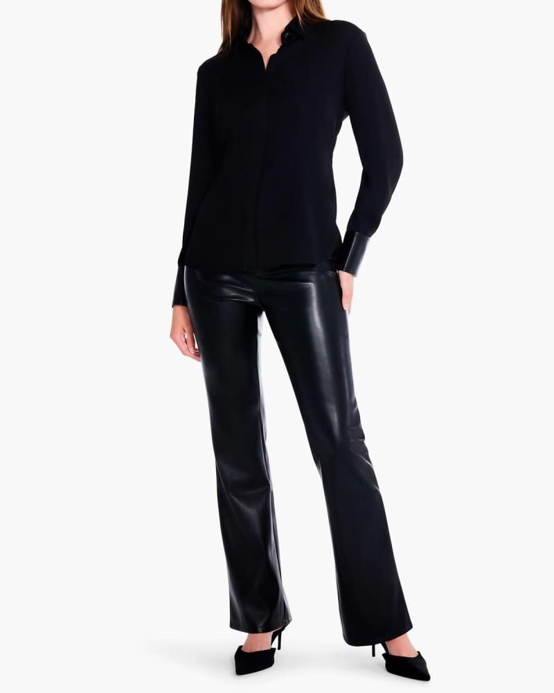 Front of a model wearing a size 10 Faux Leather Bootcut Pant in Black Onyx in Black Onyx by Nic + Zoe. | dia_product_style_image_id:327126